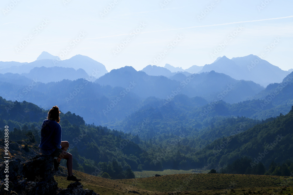 Route of the Golondrinas. Woman next to the Balagua Refuge, Pyrenees of Navarre. Route of the Golondrinas. Woman next to the Balagua Refuge, Pyrenees of Navarre.