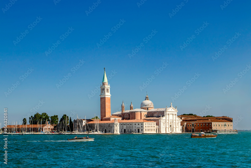 Naklejka premium San Giorgio Maggiore. Venice. The stunning and beautiful Venetian skyline showcases historic architecture along with breathtaking blue waters