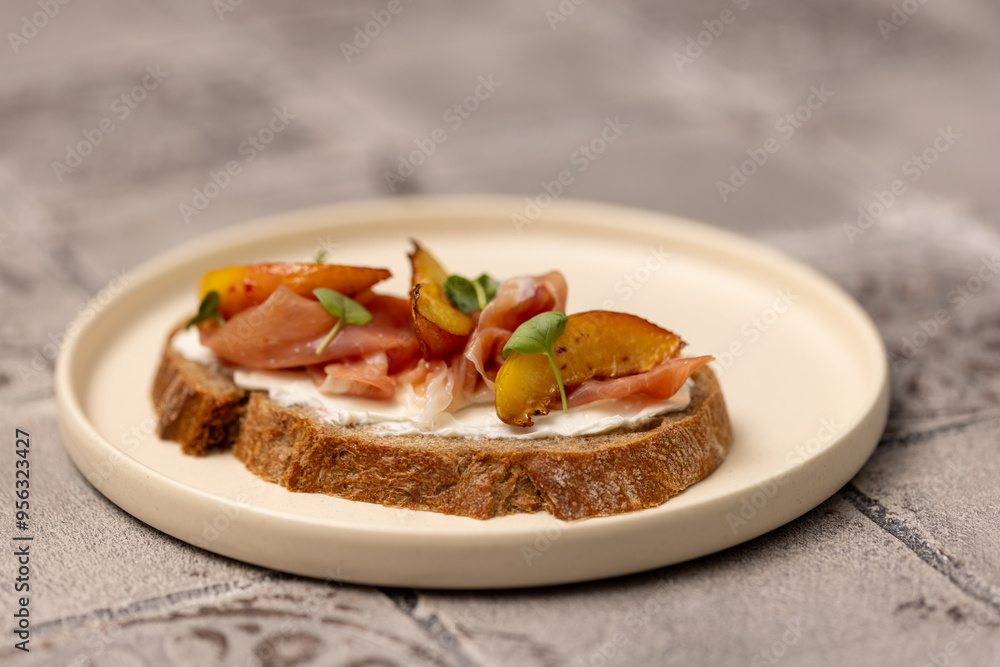 Sandwich with cream cheese, prosciutto and peach Sandwich with cream cheese, prosciutto and peach