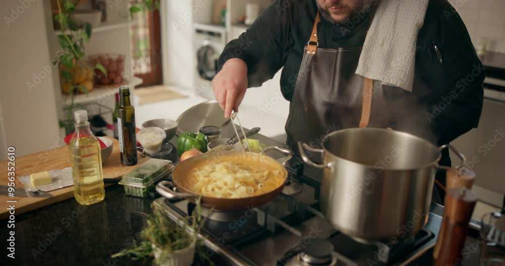 Cooking, pasta and sauce with person in kitchen for food, diet and meal prep. Nutrition, cuisine and dinner with male chef and gourmet recipe at home for wellness, dining and healthy ingredients Cooking, pasta and sauce with person in kitchen for food, diet and meal prep. Nutrition, cuisine and dinner with male chef and gourmet recipe at home for wellness, dining and healthy ingredients