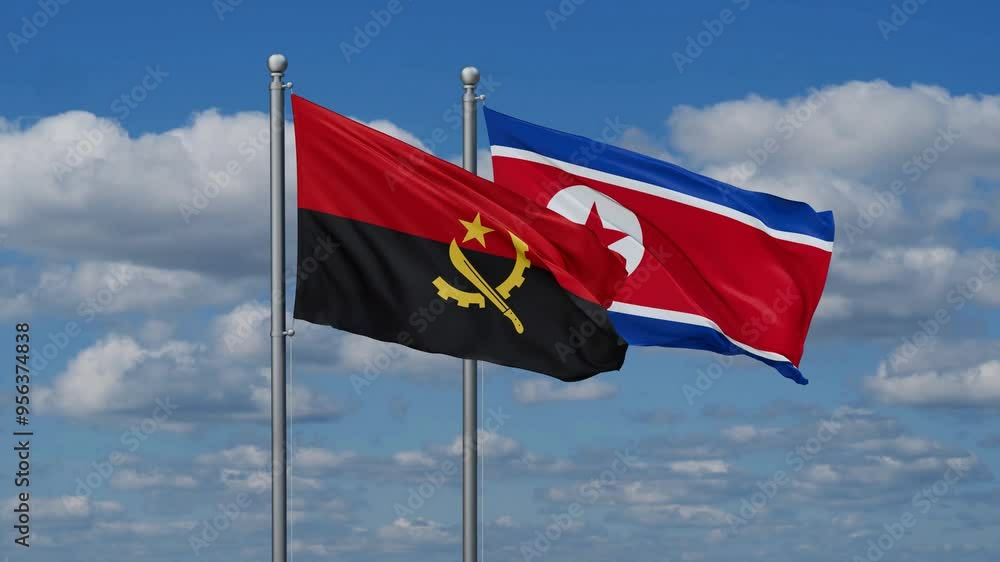 North Korea and Angola flags flying together, video concept of the relationship North Korea and Angola flags flying together, video concept of the relationship