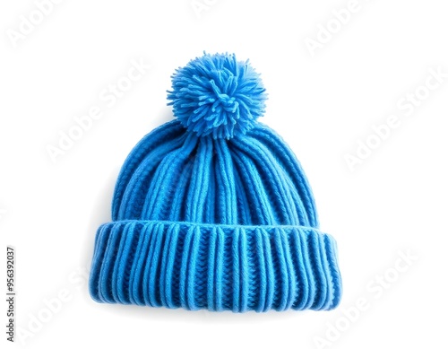 a blue beanie with a pom-pom on top, isolated on a white background, highlighting the detailed stitching create with ai