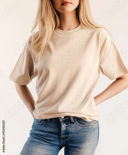 Blank Beige T-Shirt Mockup on Stylish Woman with Blonde Hair and Jeans 