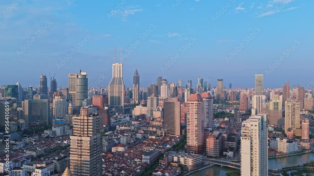 Shanghai, China - August 23rd 2024: 4K real time Aerial view of modern city skyline and buildings at sunrise in Shanghai Shanghai, China - August 23rd 2024: 4K real time Aerial view of modern city skyline and buildings at sunrise in Shanghai
