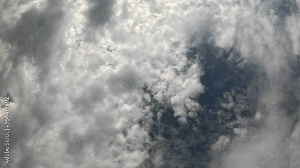 Timelapse fluffy Cumulus clouds moving in bright sunset sky. Abstract aerial nature summer ocean sunset, sea and sky view. Vacation, travel, holiday concept. Weather and Climate Change Timelapse fluffy Cumulus clouds moving in bright sunset sky. Abstract aerial nature summer ocean sunset, sea and sky view. Vacation, travel, holiday concept. Weather and Climate Change