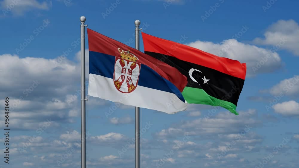 Libya and Serbia flags flying together, video concept of the relationship, two country cooperation concept Libya and Serbia flags flying together, video concept of the relationship, two country cooperation concept