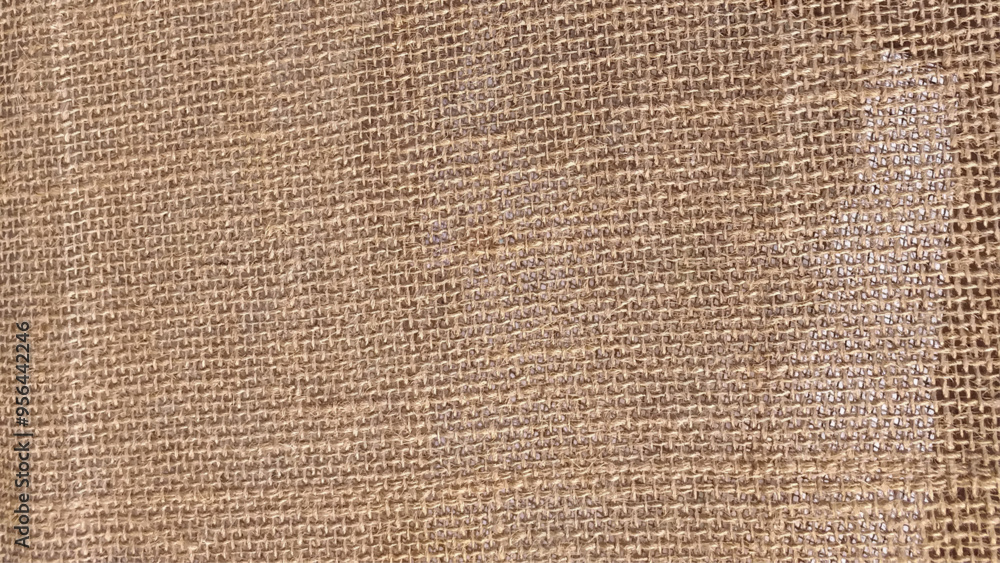 Detailed close-up of natural burlap fabric texture with woven pattern. Sackcloth or burlap texture. Closeup of natural sackcloth, canvas, fabric, jute, pattern for background Detailed close-up of natural burlap fabric texture with woven pattern. Sackcloth or burlap texture. Closeup of natural sackcloth, canvas, fabric, jute, pattern for background