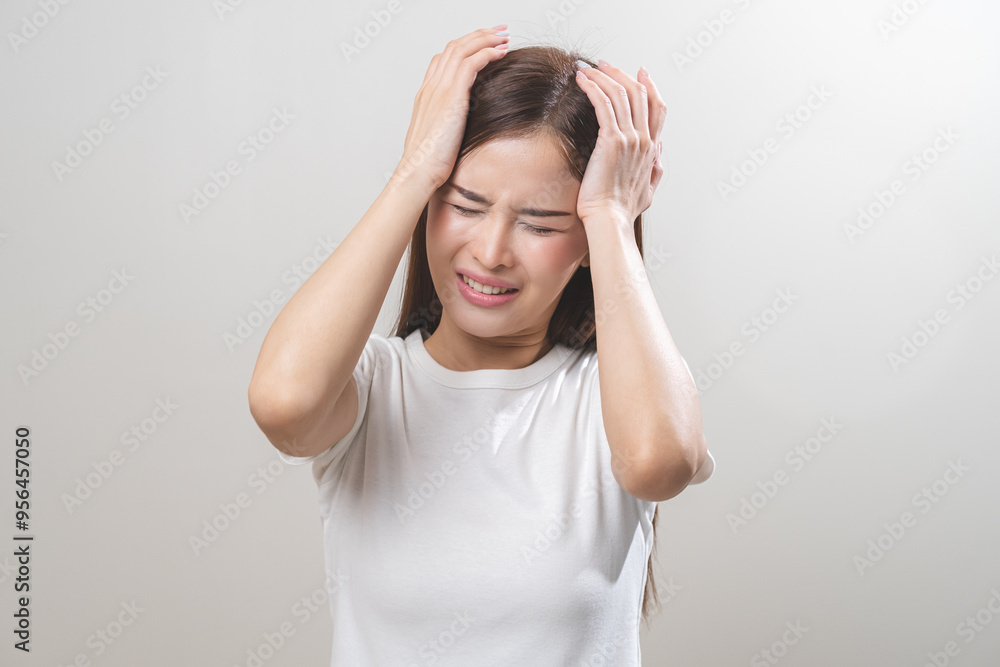 Dizzy asian young woman, girl headache or migraine pain suffering from vertigo or sick, holding head with hand, health problem of brain or inner ear not balance, standing isolated on white background. Dizzy asian young woman, girl headache or migraine pain suffering from vertigo or sick, holding head with hand, health problem of brain or inner ear not balance, standing isolated on white background.