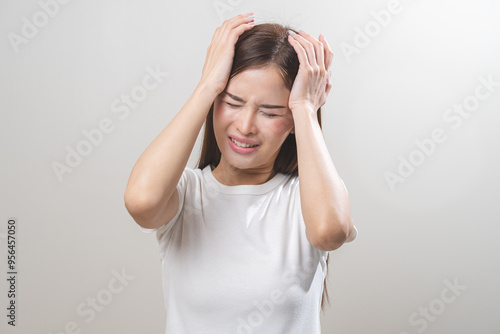 Dizzy asian young woman, girl headache or migraine pain suffering from vertigo or sick, holding head with hand, health problem of brain or inner ear not balance, standing isolated on white background.