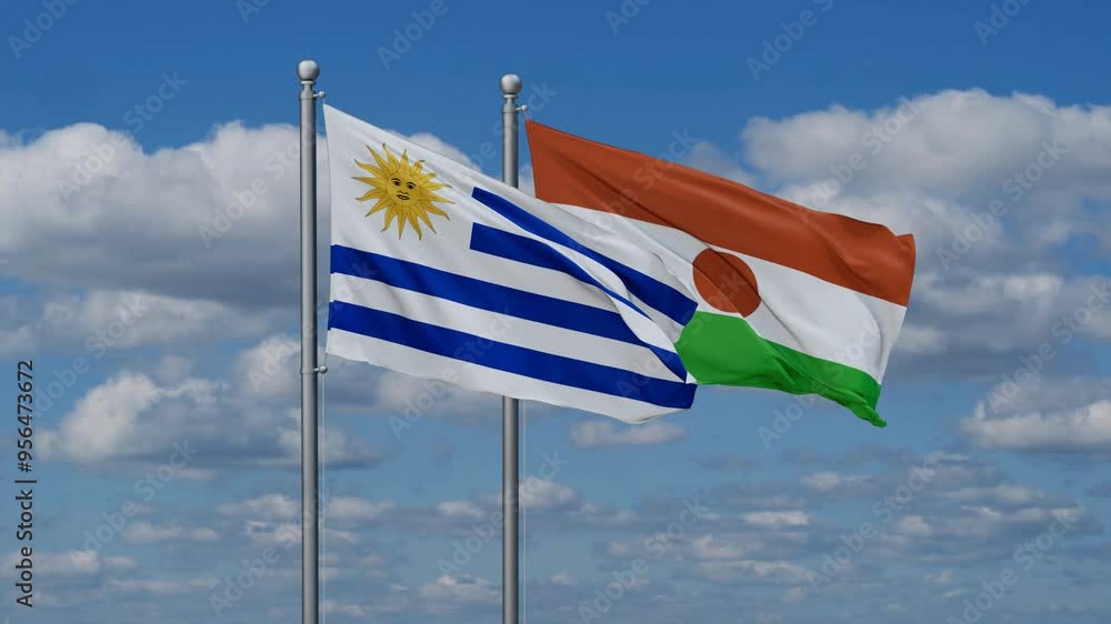 Niger and Uruguay flags flying together, video concept of the relationship, two country relations concept Niger and Uruguay flags flying together, video concept of the relationship, two country relations concept