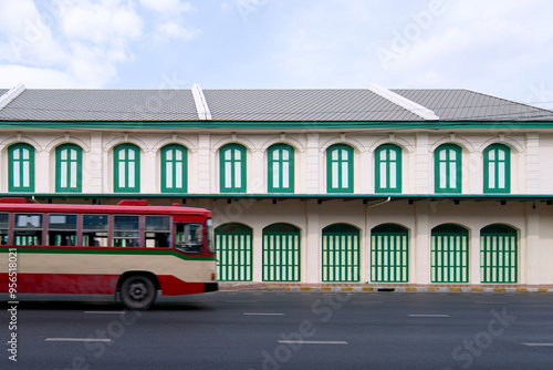 Bangkok's red and cream buses and the subway station building