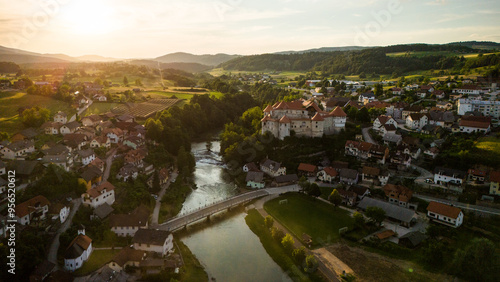 Zuzemberk Castle and medieval village on the river Krka in Slovenia. Aerial drone view