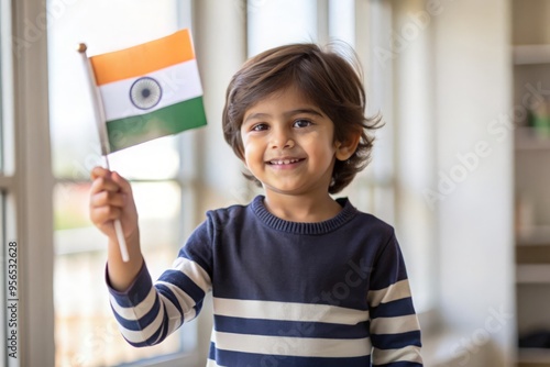 Indian Child with National Flag - An Indian child waving or holding the national flag of India.
 photo