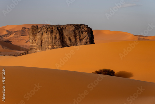 Sahara desert, sand, dunes and rocks in Algeria. Surrounding of Djanet. Place of Sahara named Moul Ennaga photo