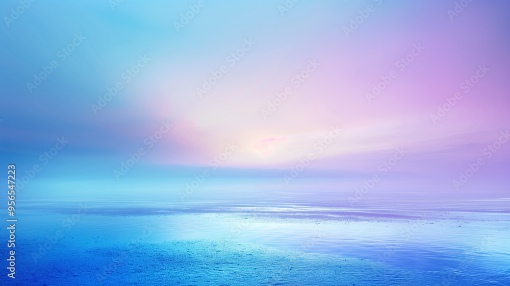 Fototapeta premium Serene Landscape with Gradient Sky Transitioning from Soft Pink to Light Blue Above Calm Water for Peaceful Nature Themes.