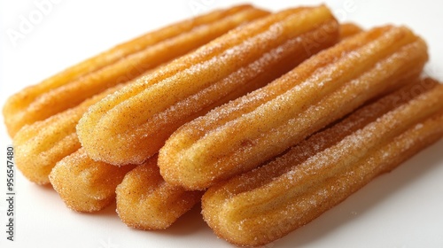 Mexican churros with a dusting of cinnamon sugar on a white background