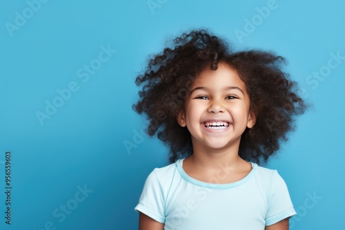 Indigo background Happy Asian child Portrait of young beautiful Smiling child good mood Isolated on backdrop ethnic diversity equality acceptance 