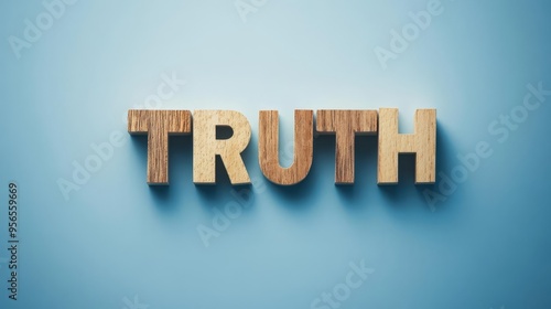 A wooden text representation of the word 'Truth' against a soft blue background, symbolizing honesty and authenticity.