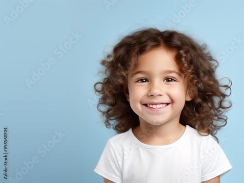 Indigo background Happy european white child realistic person portrait of young beautiful Smiling child Isolated on Background Banner with copyspace  photo