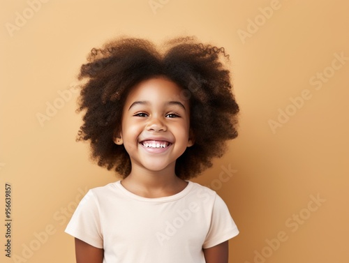 Ivory background Happy black american african child Portrait of young beautiful kid Isolated on Background ethnic diversity equality acceptance 