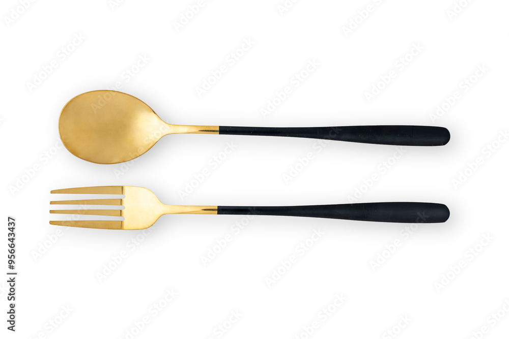 Two pieces of gold and black cutlery, one of which is a spoon Two pieces of gold and black cutlery, one of which is a spoon