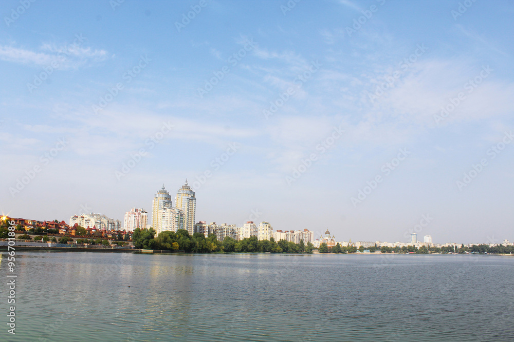 Fototapeta premium beautiful view of the city of Kyiv Ukraine on the Dnipro river, the sky, the river and the city of Kyiv