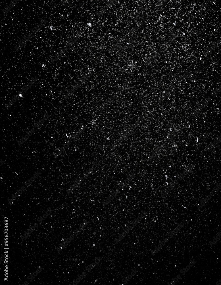 Fototapeta premium Nocturnal Snowfall: Textured White Grain and Dust Against Black