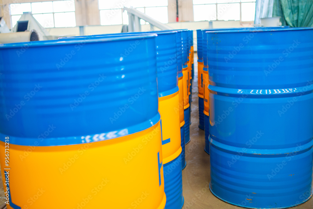 Oil drum. Stacked of blue oil barrel in the factory Oil drum. Stacked of blue oil barrel in the factory