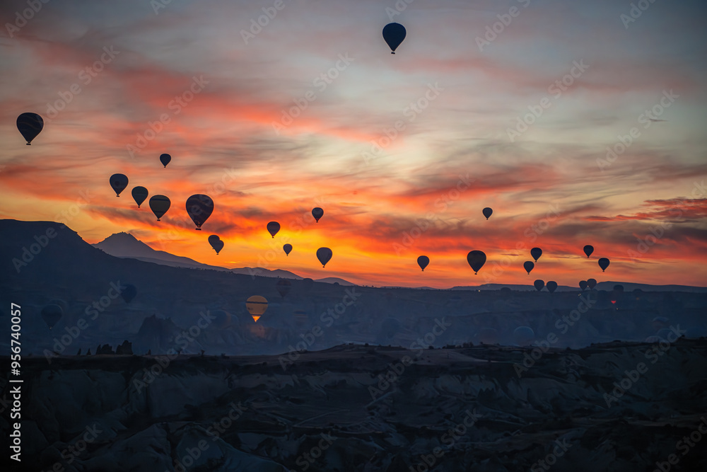 Turkey Cappadocia big tourist attraction - balloon flight. Cappadocia is recognized worldwide as one of the best places to fly with hot air balloons. Balloons in Cappadocia at sunset.