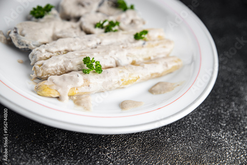 white asparagus in cream sauce fresh meal food snack on the table copy space food background rustic top view