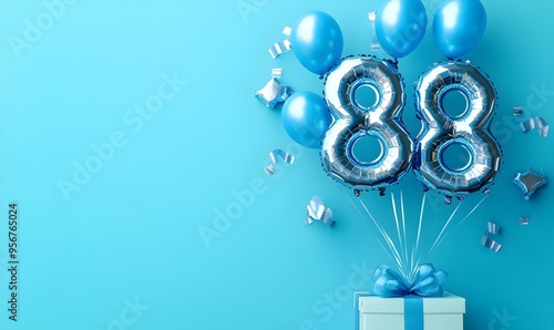 Happy birthday 88th with blue foil balloons and gift box on color background photo