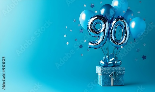 Happy birthday 90th with blue foil balloons and gift box on color background