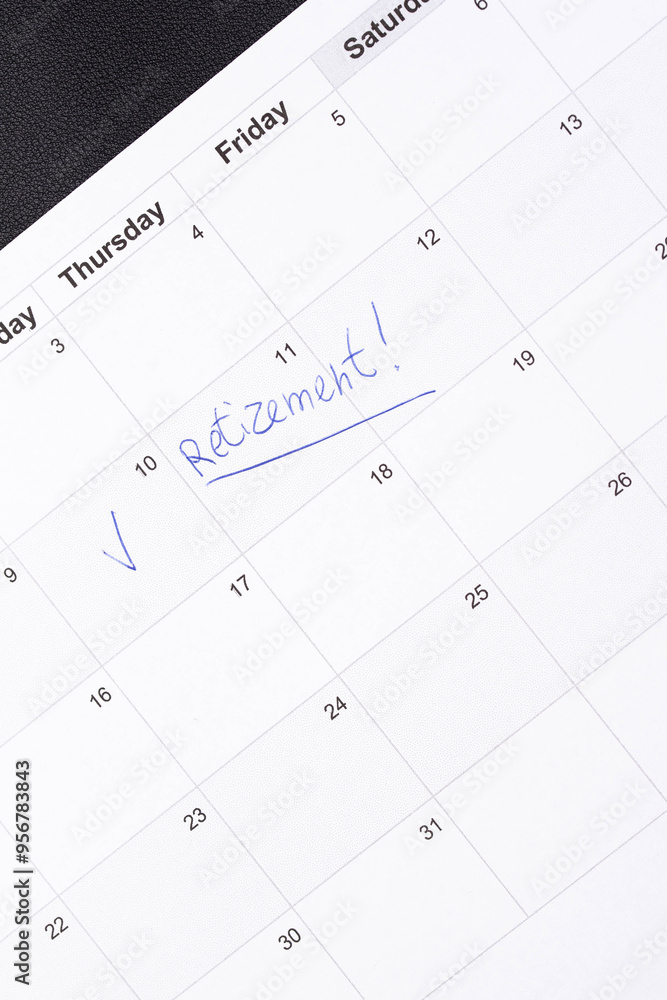 Hand fills in a large wall calendar, counting down the days until retirement, writing 'Retirement'. Concept of early retirement, the Financial Independence, Retire Early movement (FIRE) Hand fills in a large wall calendar, counting down the days until retirement, writing 'Retirement'. Concept of early retirement, the Financial Independence, Retire Early movement (FIRE)