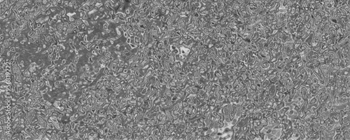 Asphalt road texture background. Stone 3d detailed grainy wall horizontal banner. Beautiful black stone texture background. Abstract old surface of gravel stone pavement road floor texture.