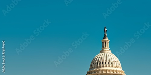 A striking image capturing the dome of a neoclassical building standing tall against a clear blue sky, highlighting its architectural grandeur and historic significance.