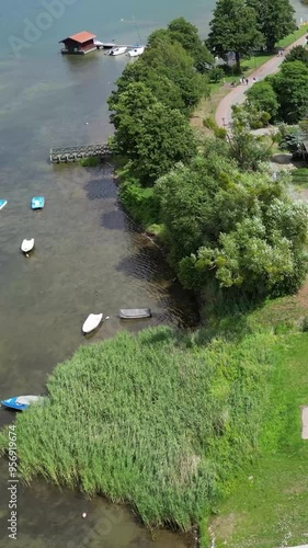 charzykowy poland aerial village town city low level holiday vacation travel destination lake district water blue boats anchored parked docked harbor photo