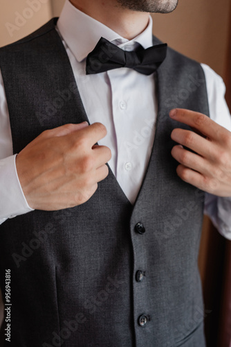 businessman adjusting his tie