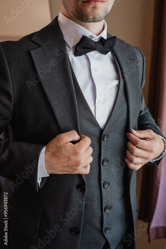 businessman adjusting his tie