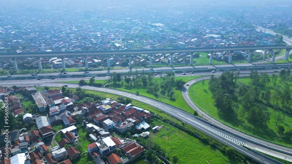 Established Aerial View of Pasir Koja Interchange, the meeting point of Soroja Toll Road, Purbaleunyi Toll Road and Jakarta-Bandung High Speed ​​Rail Line, Bandung, Indonesia