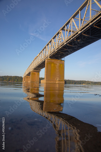 Steel Bridge with Perfect Reflection on Calm Water