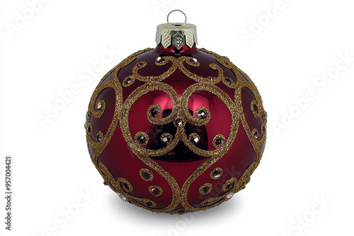 Red Christmas ornament with gold swirls and rhinestones on white background photo