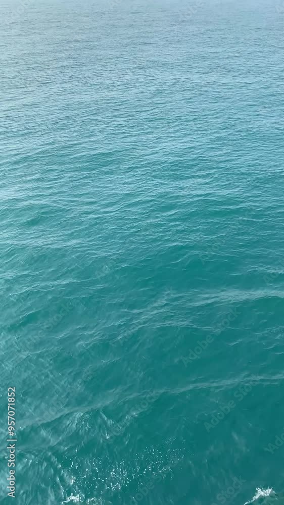 Vertical Video: calm ocean waves gently moving 4k. Vertical Video: calm ocean waves gently moving 4k.