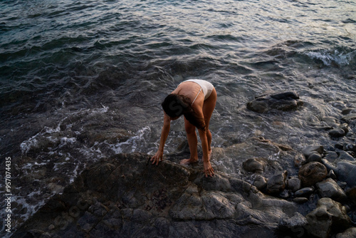 Woman Coming Up Of Water  photo