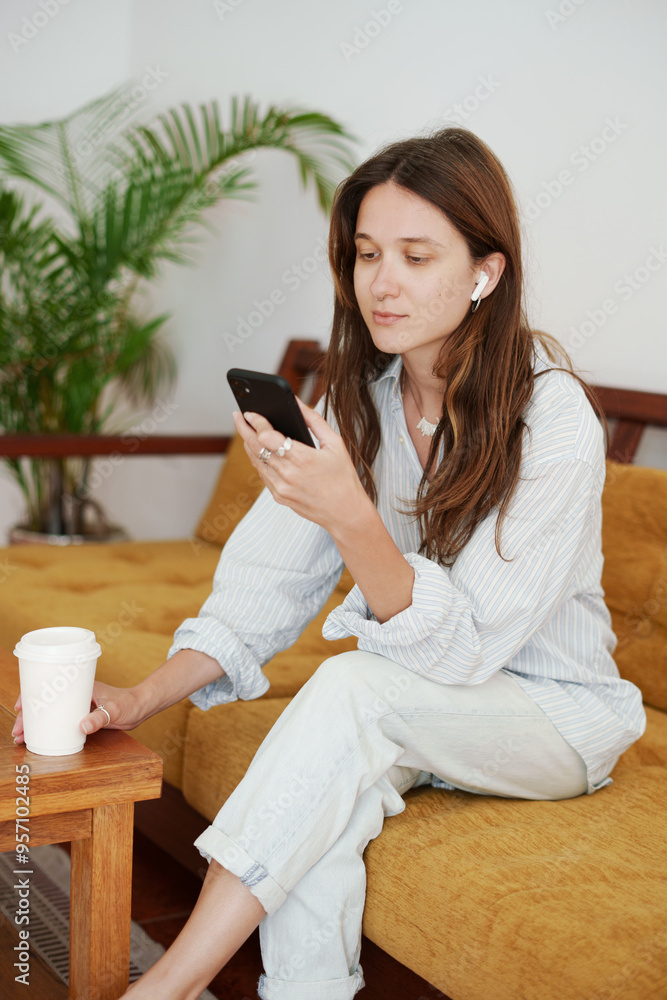 Relaxed Woman Using Smartphone Relaxed Woman Using Smartphone
