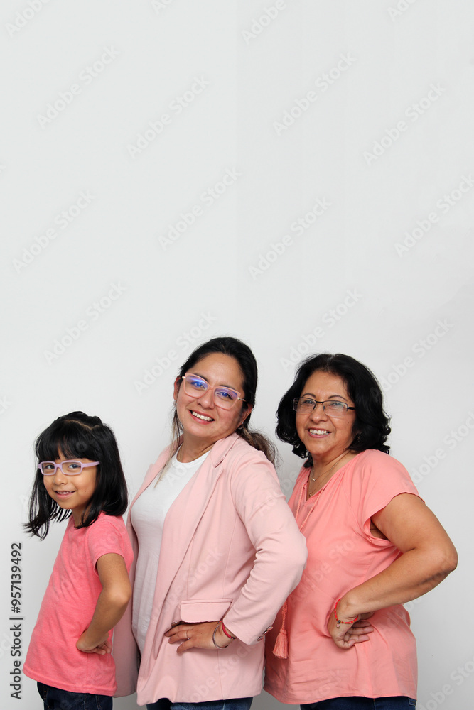 Brunette Latina grandmother, mom and daughter with glasses show their love and support together and unite to celebrate Mother's Day Brunette Latina grandmother, mom and daughter with glasses show their love and support together and unite to celebrate Mother's Day