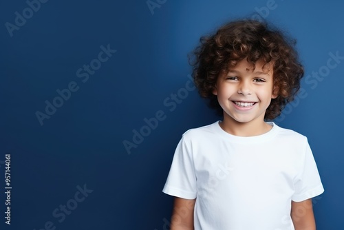 Navy background Happy european white child realistic person portrait of young beautiful Smiling child Isolated on Background Banner with copyspace  photo