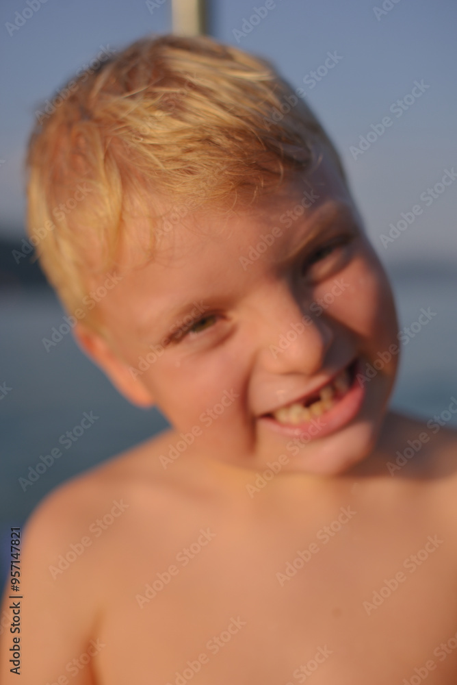 A 6 years old funny kid on a lake A 6 years old funny kid on a lake