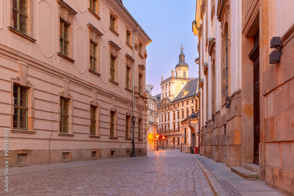 Peaceful street with historic buildings in the old town of Wroclaw, Poland, during the early evening Peaceful street with historic buildings in the old town of Wroclaw, Poland, during the early evening