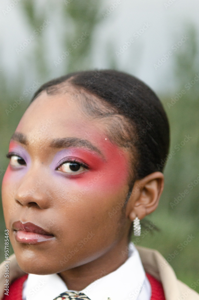 Young African woman with colouful make up Young African woman with colouful make up