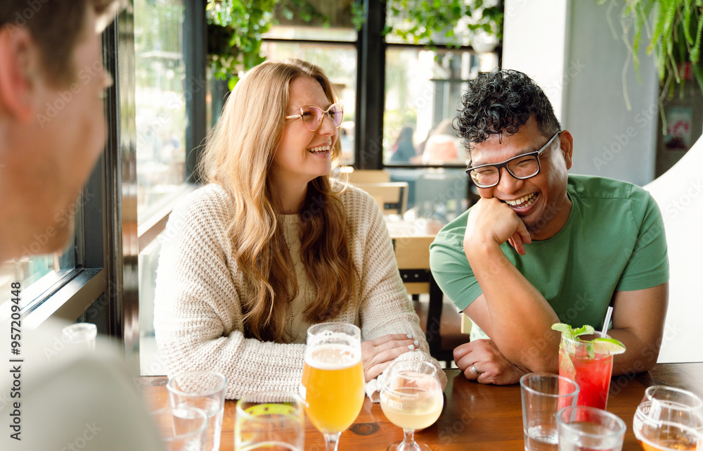 Friends Laughing At Restaurant Friends Laughing At Restaurant